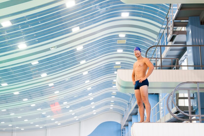 long-shot-smiling-man-swimming-pool-trampoline_23-2148326852.jpg